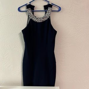 Stunning bodycon dress. Perfect for winter dances or homecoming!